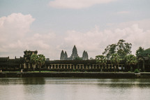temple ruins across the water in Cambodia 
