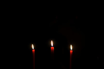 Red candles burning