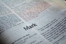 A Bible opened to the book of Mark.