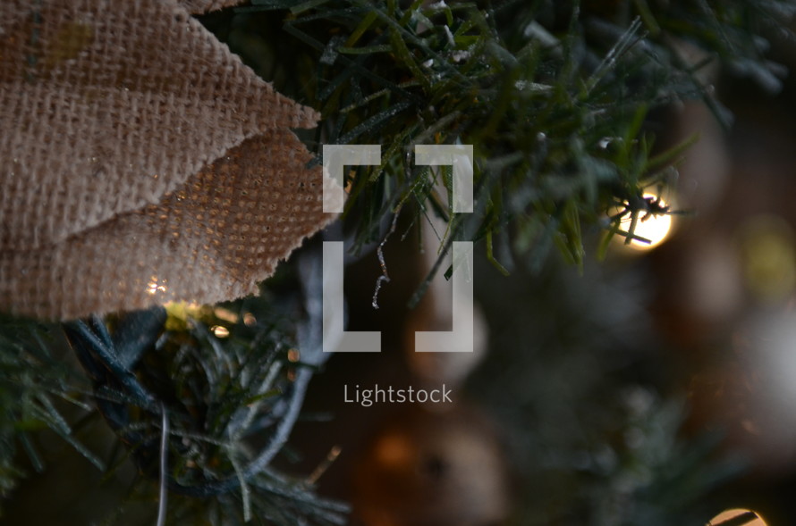 burlap and Christmas lights on a Christmas tree