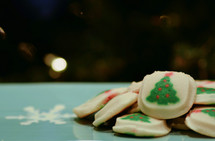 Christmas cookies in front of a Christmas tree 