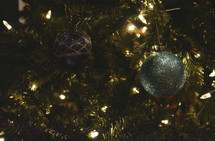 blue ornaments on a Christmas tree 
