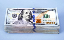 A stack of hundred dollar bills 