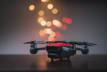 Drone aircraft and colored lights on a background