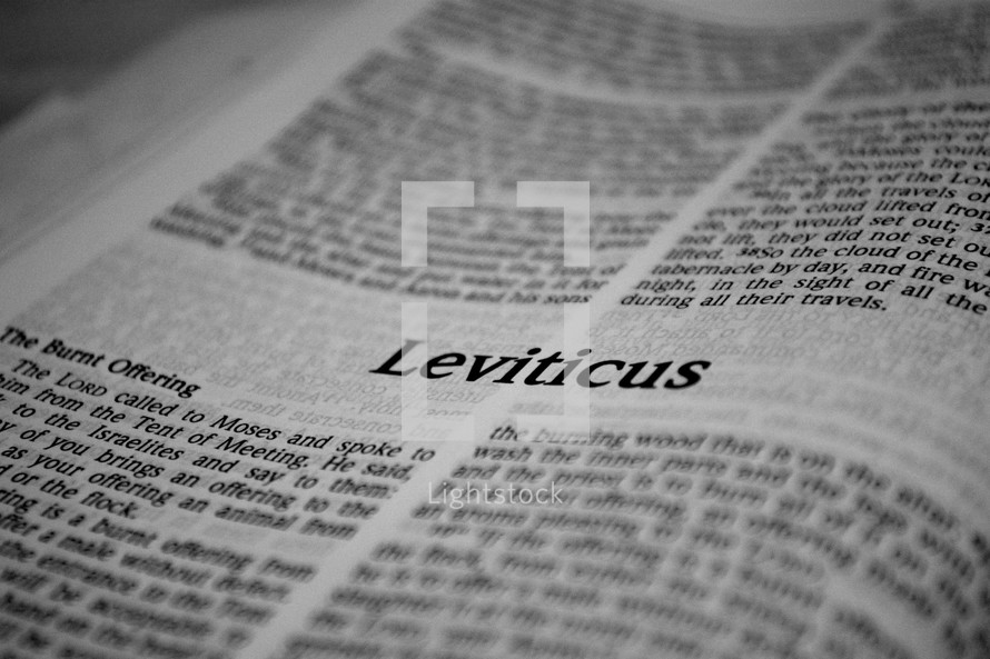 A Bible opened to Leviticus.