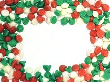 Christmas red, green, and white chocolate chips in a frame 
