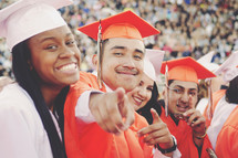pointing high school graduates 