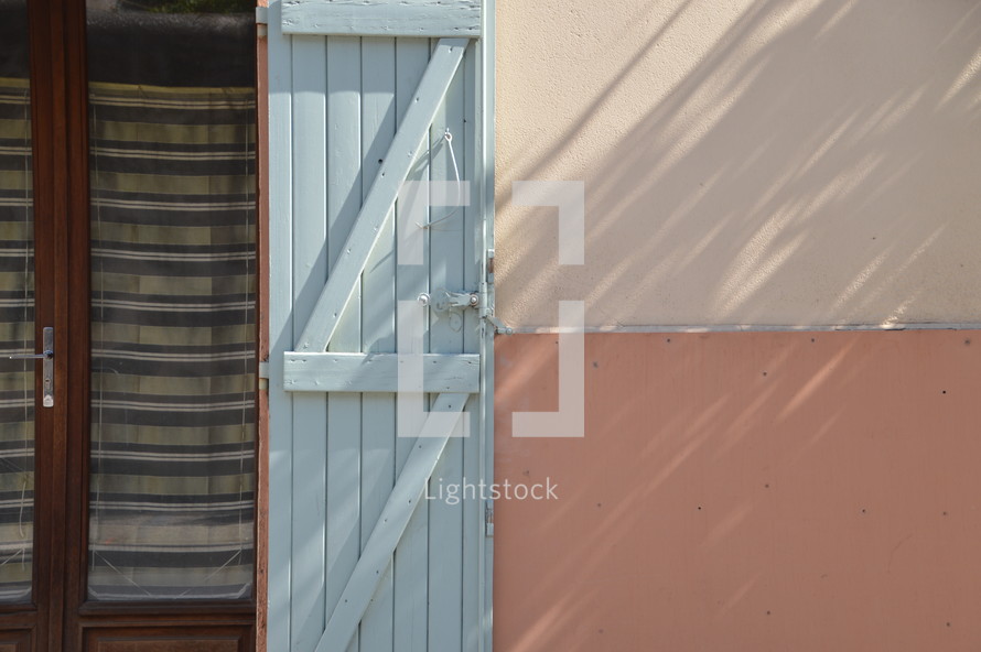 light blue wooden shutters 