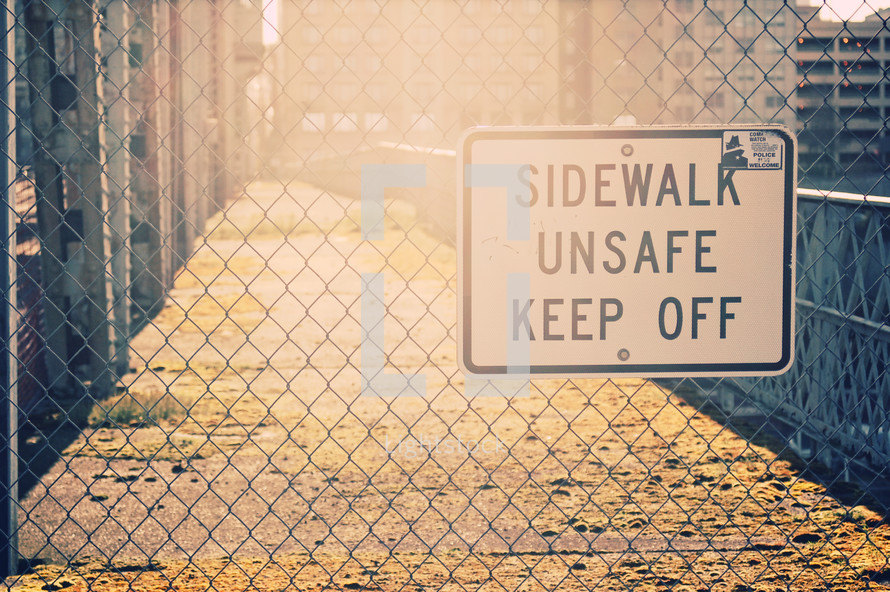 sidewalk unsafe keep off sign 