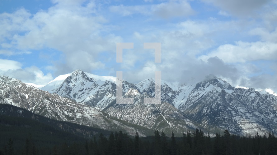 snow covered mountain peaks 