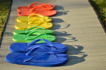 flip flops drying on a mat 
