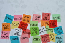 colorful pile of notepads with new year's resolutions for christian life 