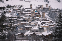 Snowy stone towers in the village