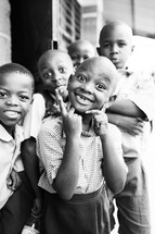smiling faces of a young children 