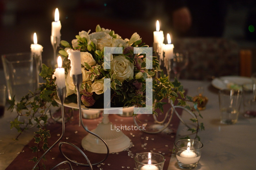 centerpiece on a table at a reception 