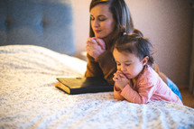 bedside prayers with mother and daughter 