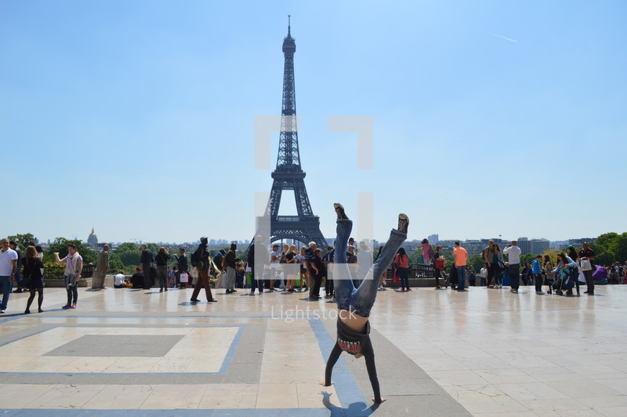 handstand and view of the Eiffel Tower 