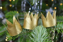 three crowns on a Christmas tree