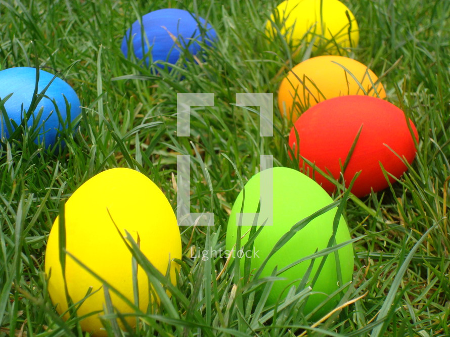 Multicolored Easter eggs in the grass, 
