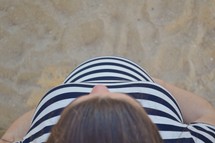 pregnant woman on a beach 
