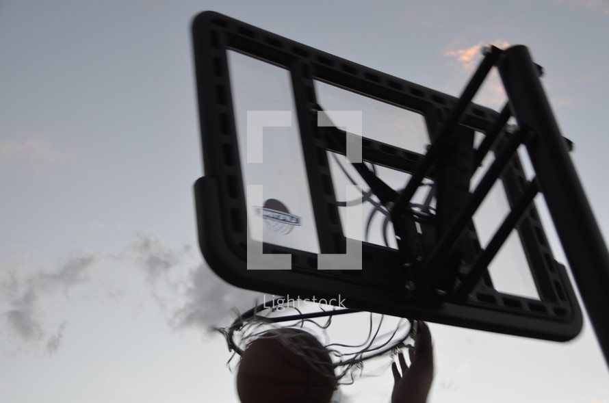 dunking a basketball 