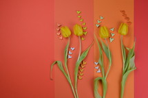 tulips on yellow, orange, and red 