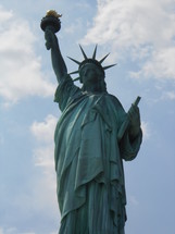 Statue of Liberty holding her torch 
