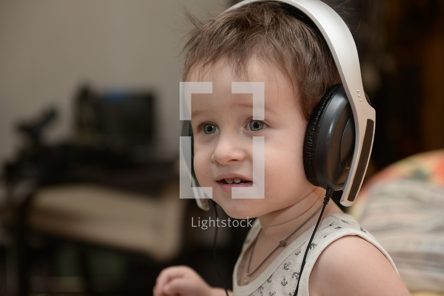 toddler with headphones 