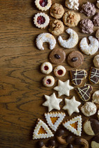 cookie assortment on wooden table as border 