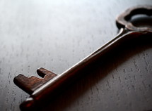 skeleton key on a wood floor 