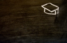 graduation cap in chalk 