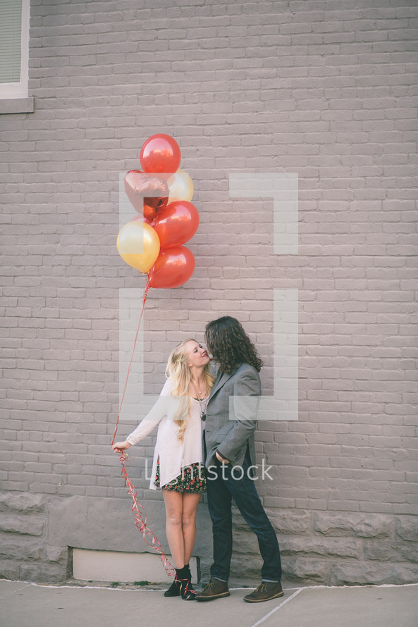 couple and balloons 