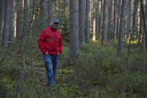 man standing in a forest 