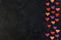 hearts border on a black background 