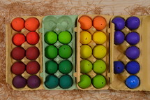 colorful Easter eggs in an egg carton 