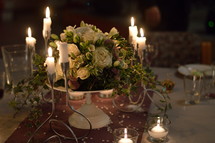 centerpiece on a table at a reception 