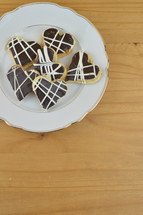 heart shaped cookies on a plate 