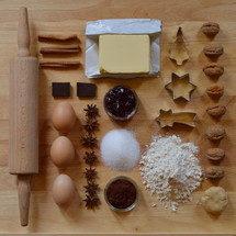 Flat lay with baking ingredients for christmas cookies as a square 