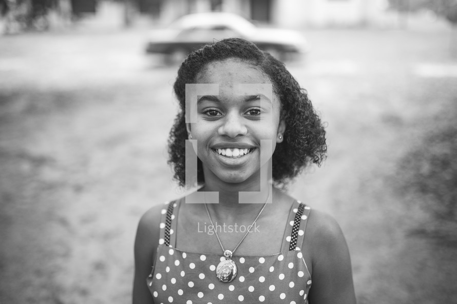 a happy African American teen girl 