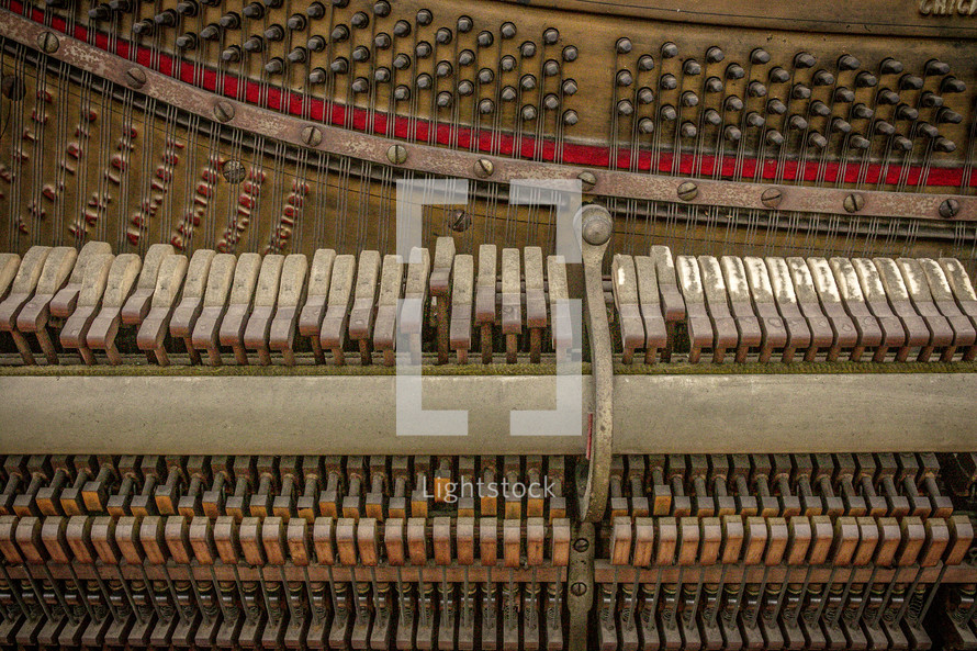 insides of an old piano 