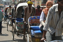 row of pedicabs in India 