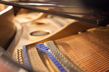 Strings inside of a grand piano