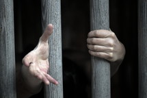 captive behind bars