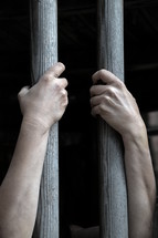 captive behind bars