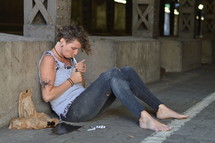 homeless woman smoking 
