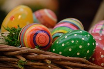 Colorful Easter eggs in a basket 