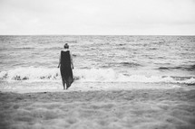woman standing on a shore 
