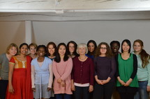 a group of diverse women standing together 
