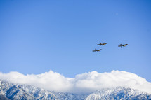 planes flying over mountains 