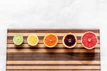 citrus fruit on a cutting board 